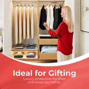 A woman in a red top stands in front of an open wooden closet, reaching for a hanging garment. Caraselle Cotton Garment Covers and folded clothes and drawers are visible inside, with a red promotional banner at the bottom reading 'Ideal for Gifting' and 'Luxury protection for their cherished garments.