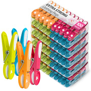 Packaged colorful clothespins with a clear display box on a white background