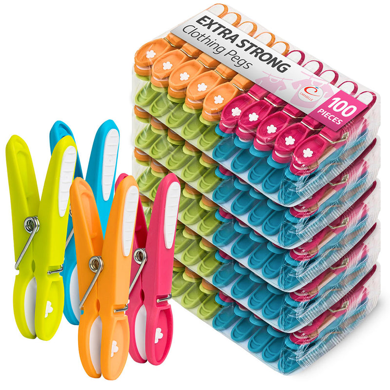 Packaged colorful clothespins with a clear display box on a white background