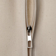 Close-up of strong zip fastening on cotton garment cover